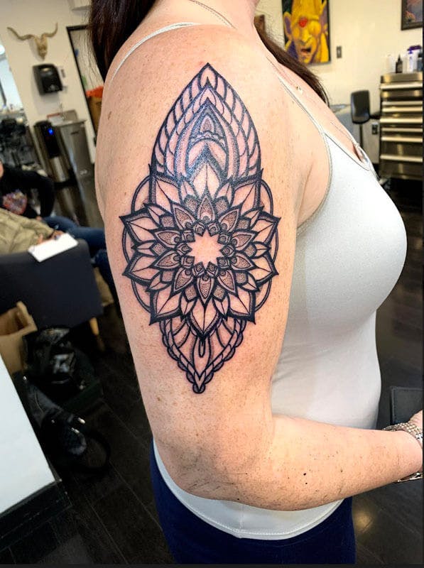 2Matt-black and gray sacred geometry tattoo on arm