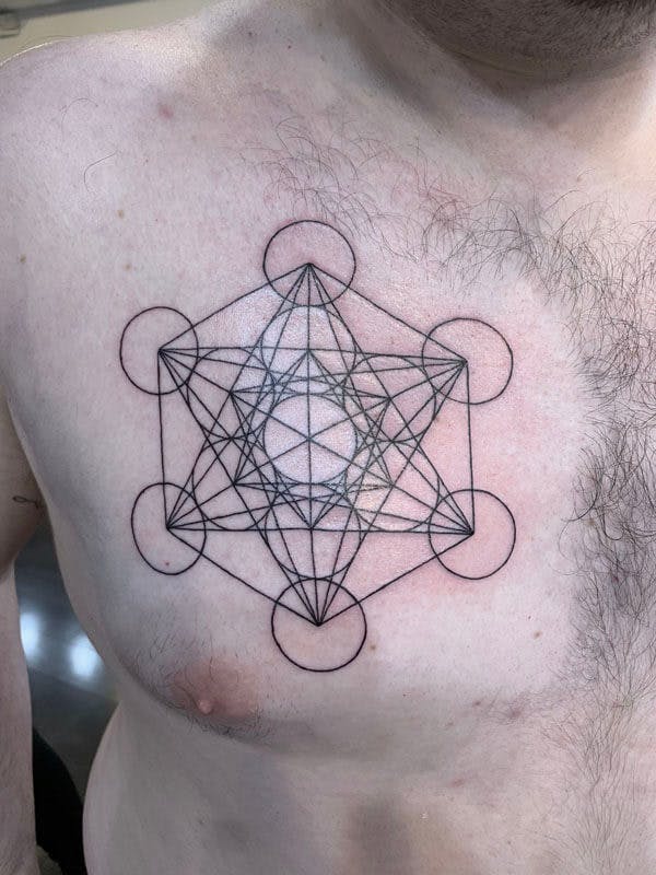 6Matt-black and gray sacred geometry tattoo on chest