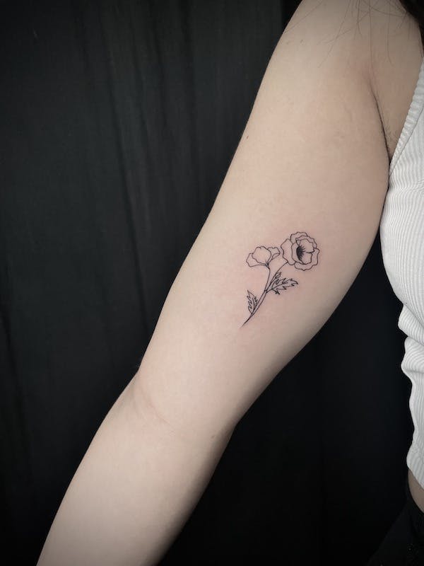 Fine line flower tattoo by Gabe, Fattys Tattoos & Piercings