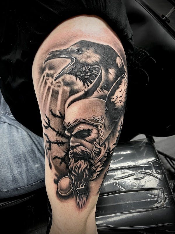 24 black and gray Odin tattoo on arm